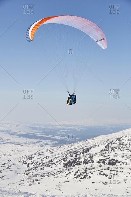 Person paragliding from the Offset Collection