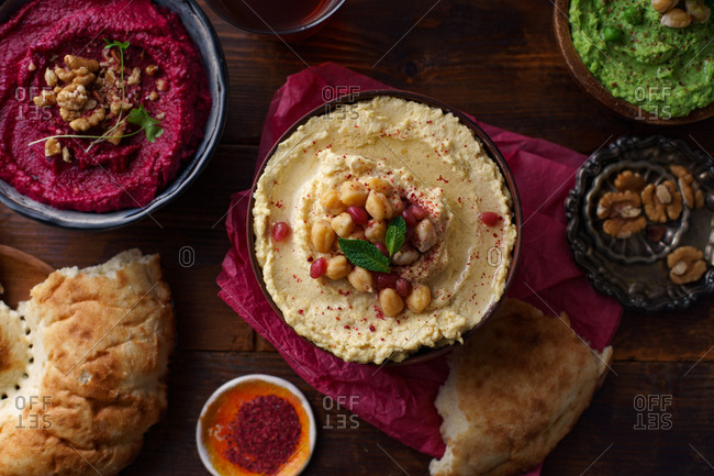 Israeli cuisine: hummus variety, fattoush, baba ganoush, flat bread