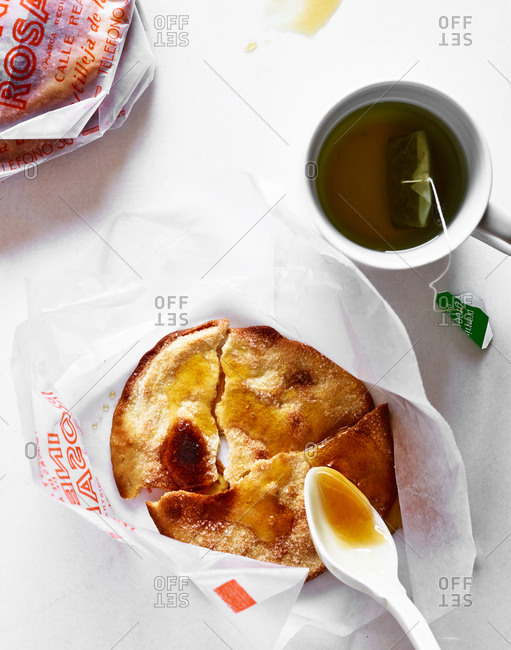 March 6, 2018 - Crispy pastry drizzled in honey served with a cup of peppermint green tea