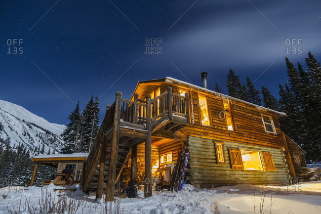 View of illuminated exterior of mountain hut at night,���San Isabel National Forest, Colorado, USA