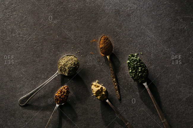Variety of spices on spoons