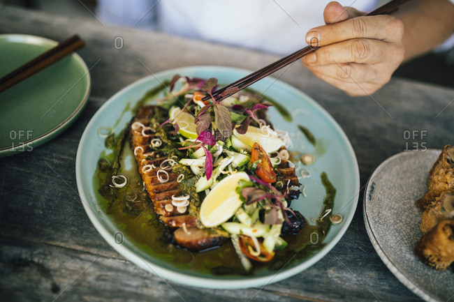 Ho Chi Minh City, Vietnam - August 1, 2018: Slow-cooked and char-grilled pork with Vietnamese herbs and spices at Anan Restaurant
