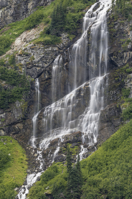 Waterfall flowing into Rainy Lake, Washington State, North Cascades National Park