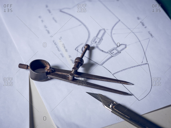 Shoe making tools lying on drafts