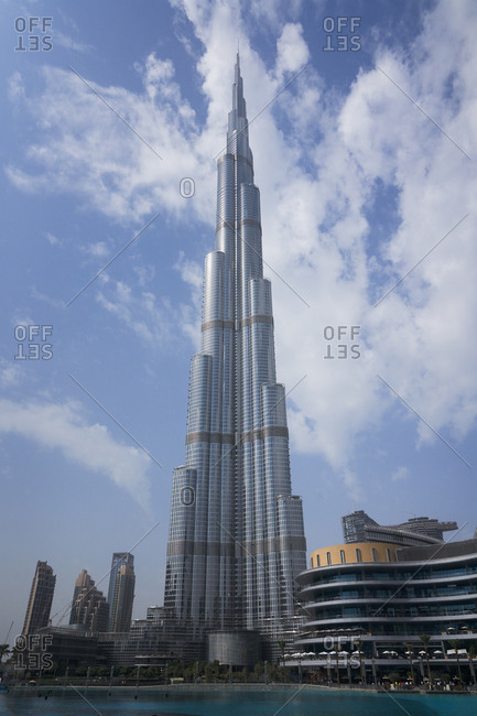 Dubai, United Arab Emirates - November 25, 2018: Burj Khalifa building and silhouette of tree branches
