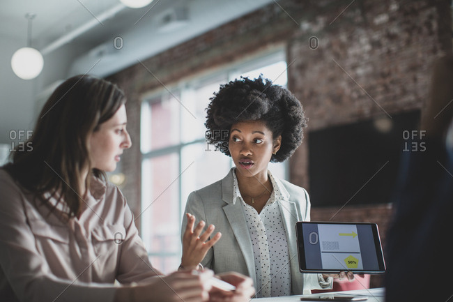 African American businesswoman leading a meeting