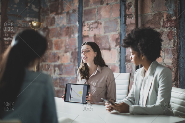 Businesswomen presenting to a client
