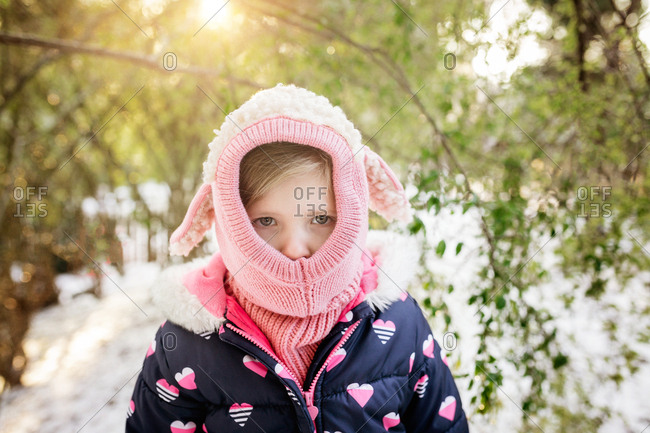 Little girl with a lamb hat on a cold day