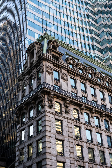 New York City - USA - DEC 26 2018: Perspective view to facade fragment of the modern and old building in midtown Manhattan