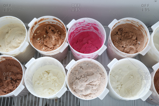 Tubs of ice cream in an ice cream shop