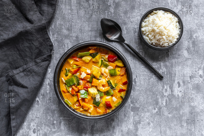 Curry dish- sweet potato curry- sugar pea- paprika- zucchini- coconut milk- shrimps and rice