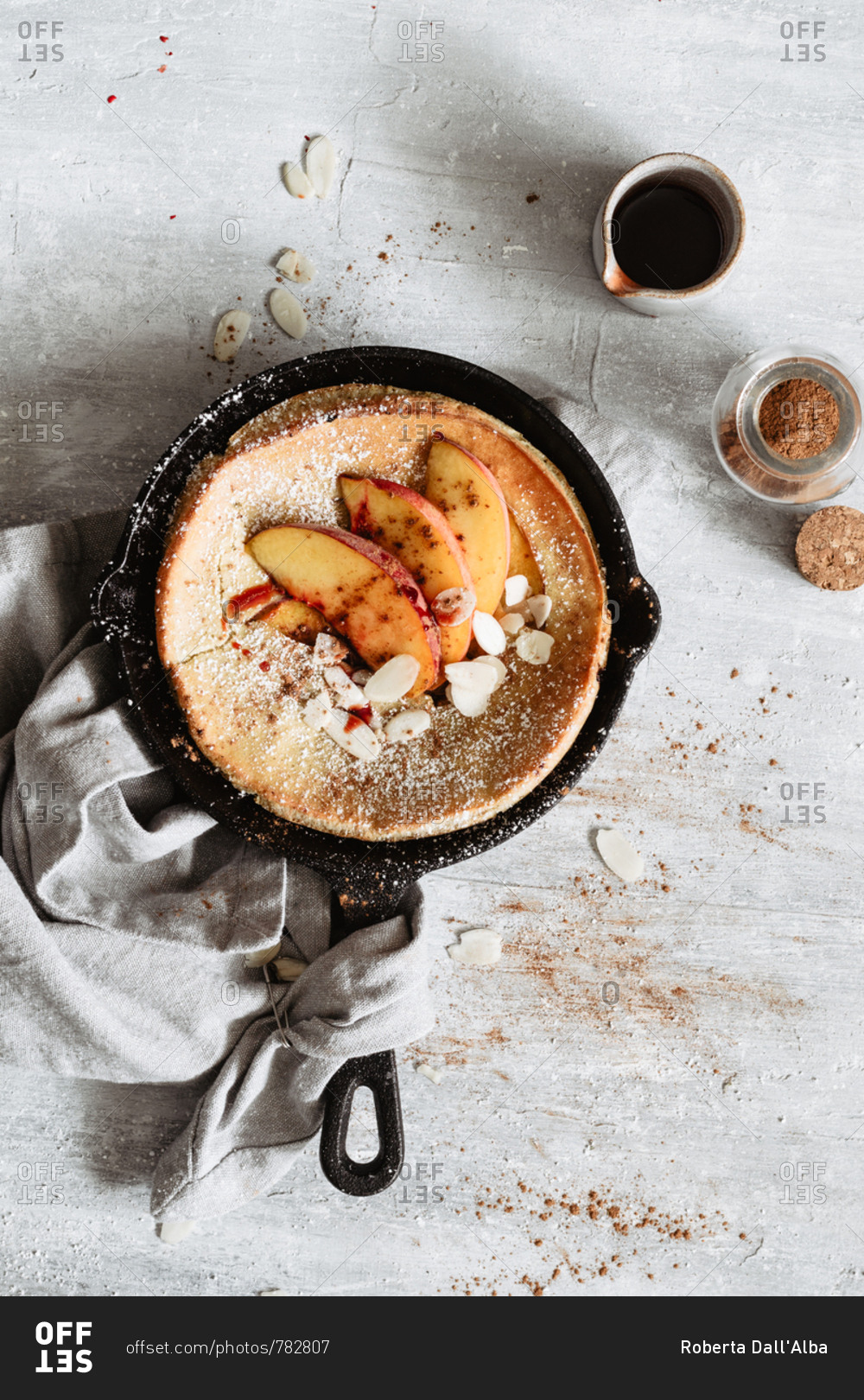 Easy dutch baby pancake with peach and date syrup