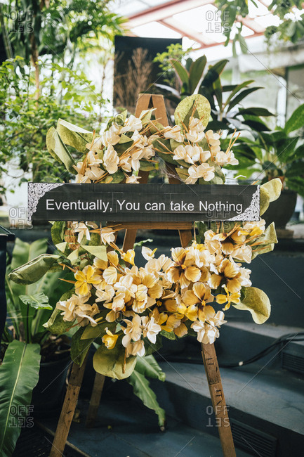 Bangkok, Thailand - July 25, 2018: Flowers and platitudes at Kid Mai Death Awareness Cafe