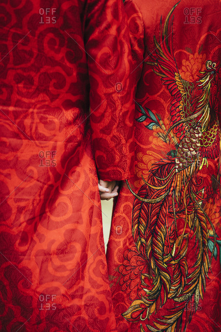 Hanoi, Vietnam - October 27, 2018: A husband and wife in traditional Vietnamese wedding outfits