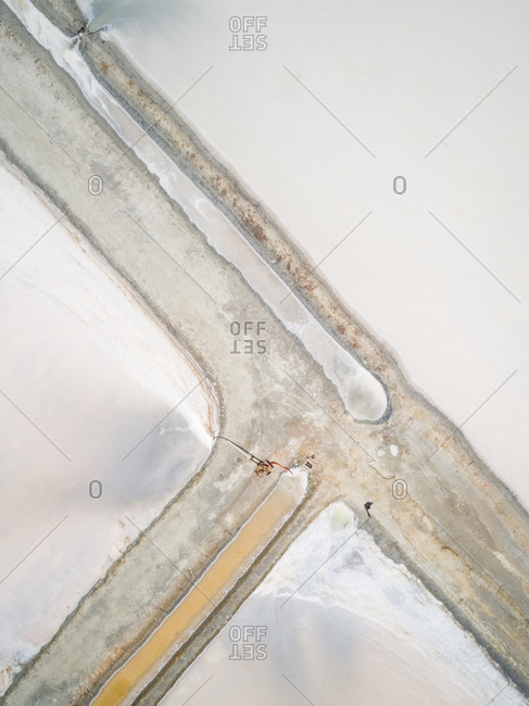Aerial view above of white salines industry near the ocean, Brazil.