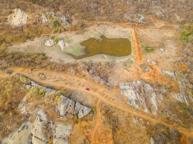 Aerial view of car driving through arid area, Ceara, Brazil