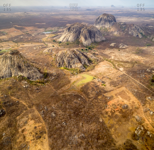 Aerial view of rock mountain formation on arid area, Ceara, Brazil.
