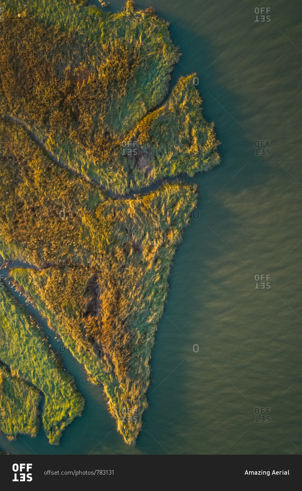 Aerial view above of wide wetland ecosystem near the ocean, Netherlands.