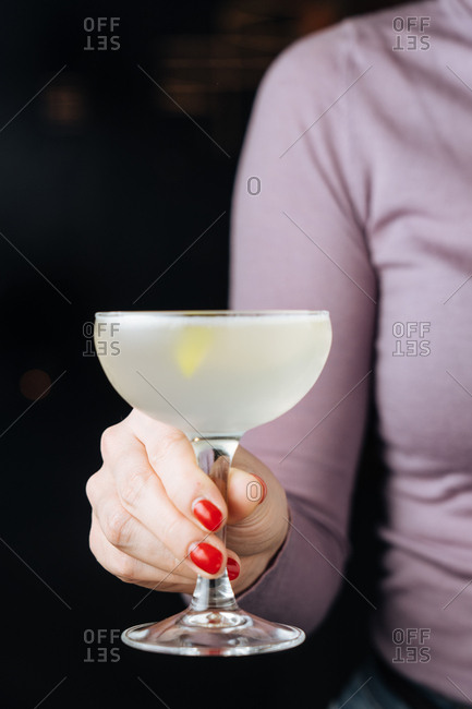 How to Hold a Cocktail Glass