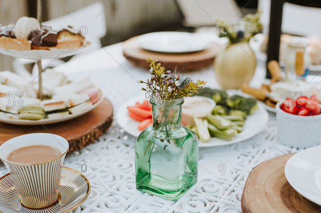 Small Flower Arrangement On An Outdoor Table Stock Photo Offset Small Flower Arrangement On An Outdoor