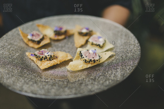 Woman serving wedding appetizers