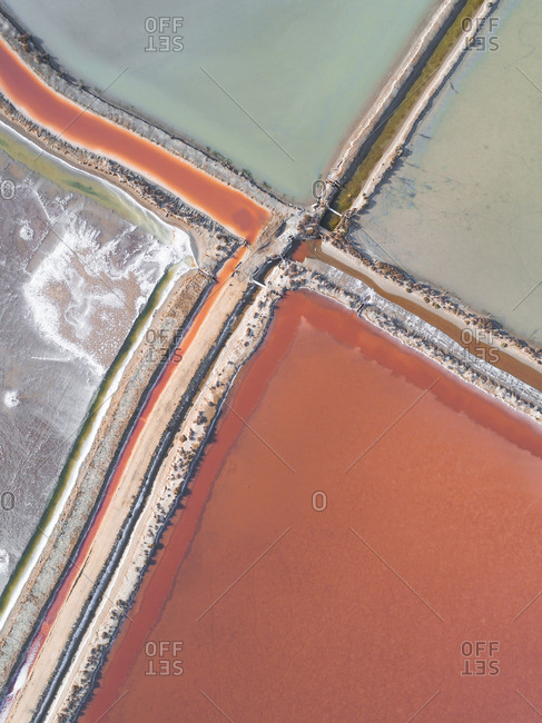 Overhead view of colorful salt ponds in Spain