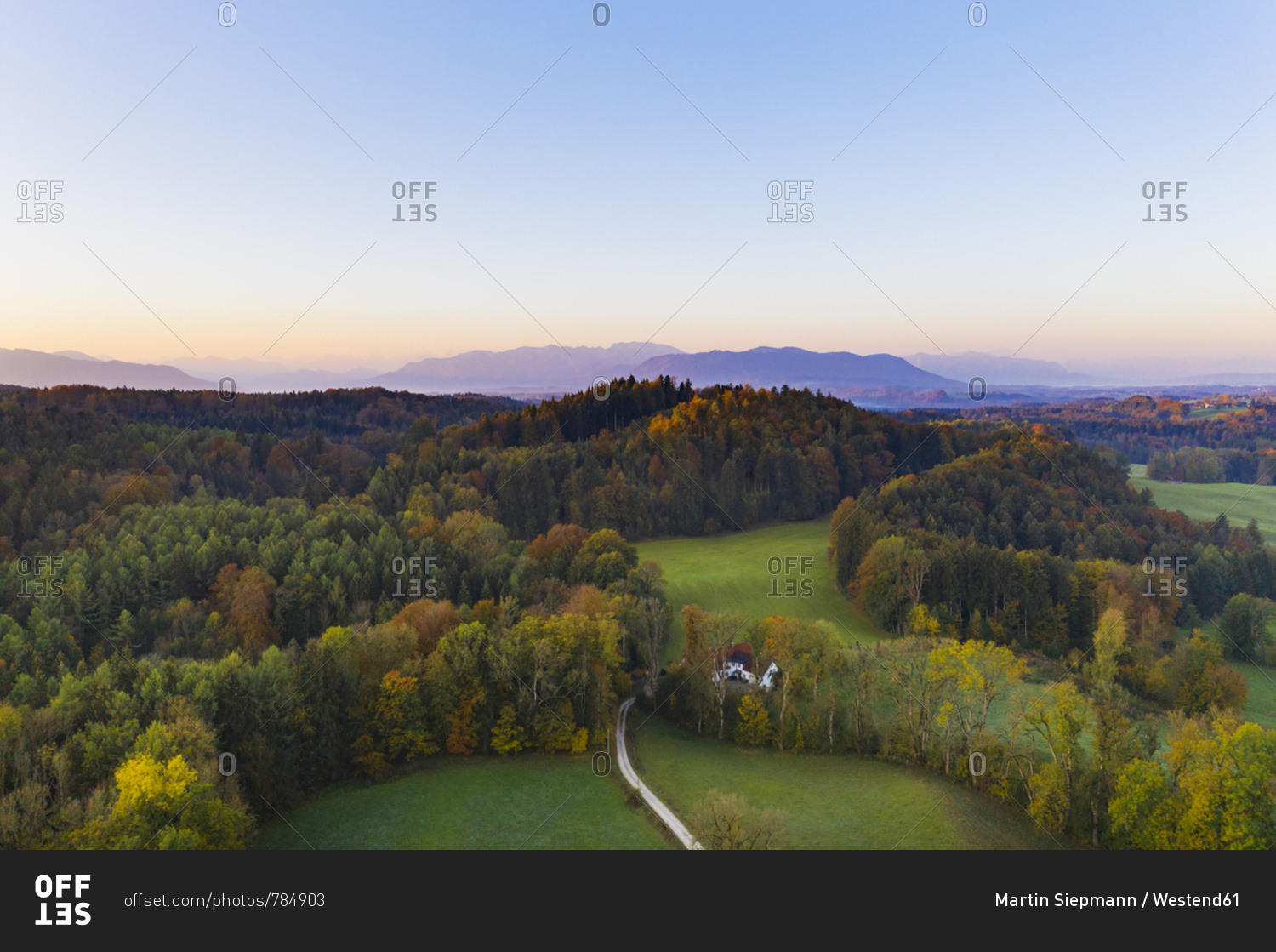 Germany- Upper Bavaria- Toelzer Land- Bavarian Prealps- Dietramszell- Zeller Wald- Aerial view of forest in autumn at sunrise
