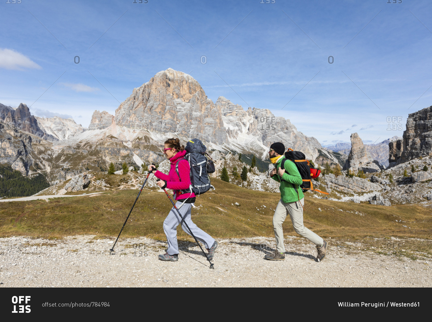 Italy- Cortina d'Ampezzo- two people hiking in the Dolomites mountain area