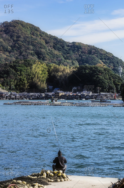 Japan- Kyoto Prefecture- fishing village Ine- townscape with angler