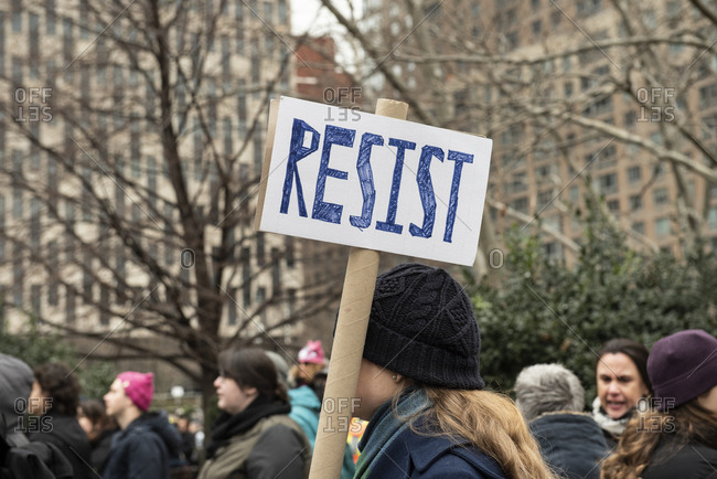 Foley Square - January 19, 2019: Resist sign at the Womens March in Foley Square, in New York City, NY, USA, on January 19th, 2019.