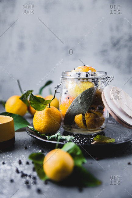 Citrus fruits stored in a glass jar