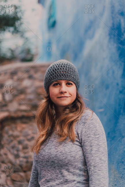 Pretty woman at steps on street