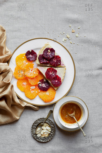 Slices of gluten free blood orange ricotta tart