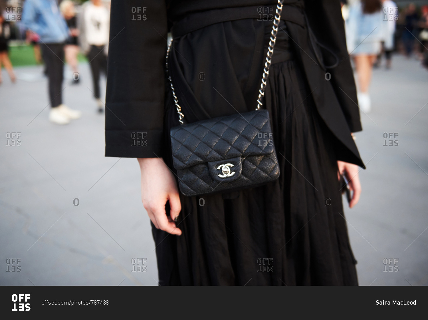 March 09, 2018- Melbourne, Australia: Fashion event guest wearing Chanel  crossbody bag in all black stock photo - OFFSET