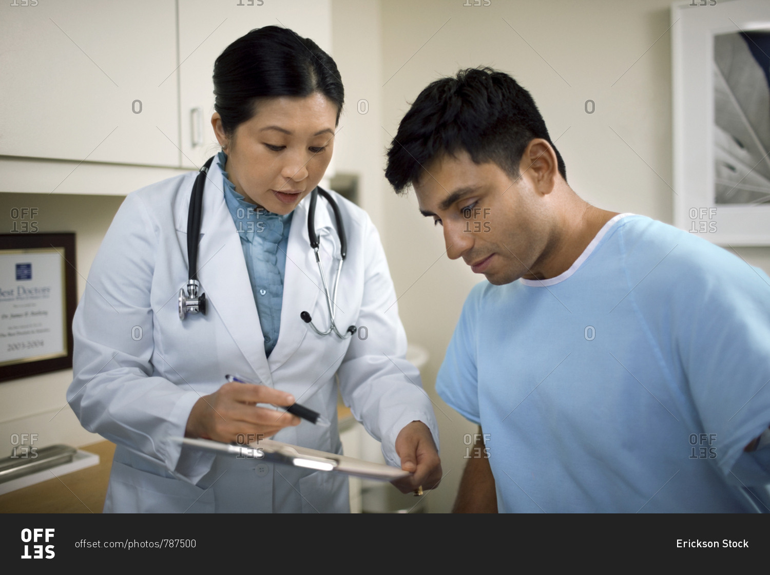 Female doctor consulting with a patient after a medical examination in her office.