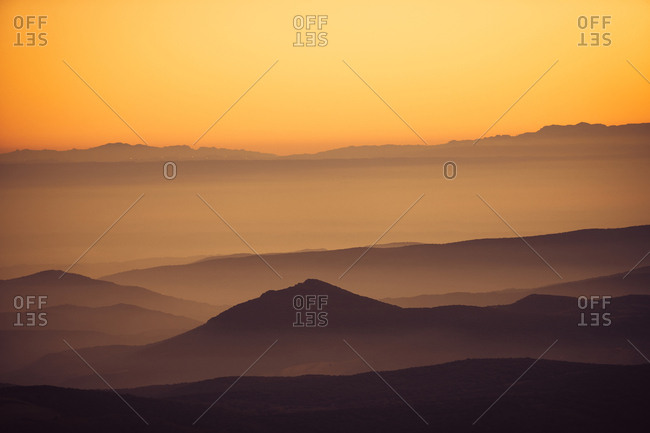 Landscape of golden sunset over mountains