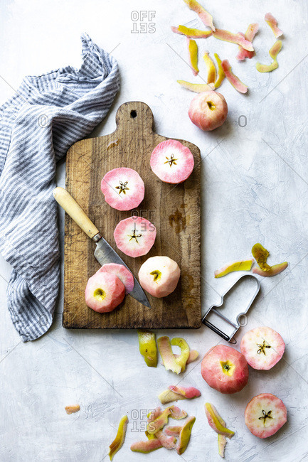 Chopped pink apples on a chopping board