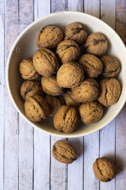 Whole walnuts in a bowl.