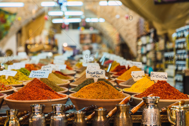 Stall with assorted spices and various cezves located on market in Jerusalem, Israel