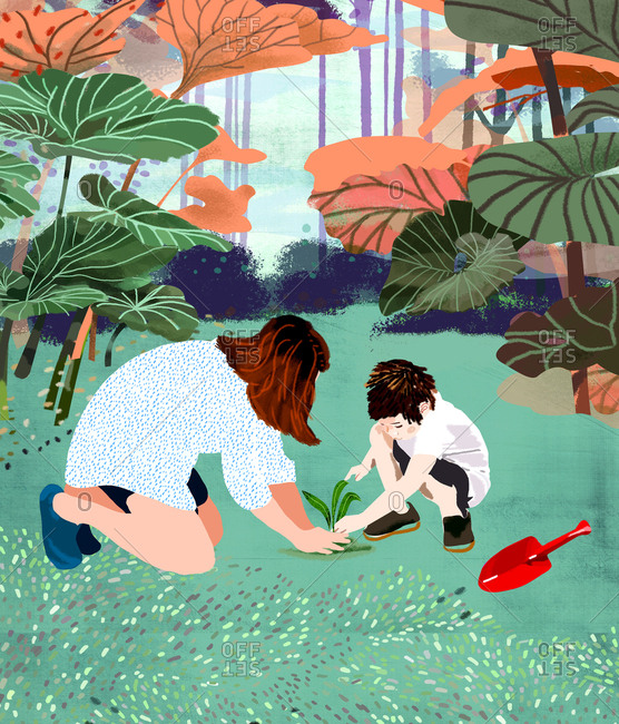 Mother and child plant a plant in the garden