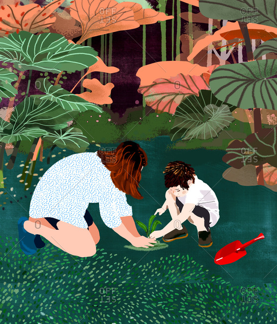 Mother and child plant a plant in the garden