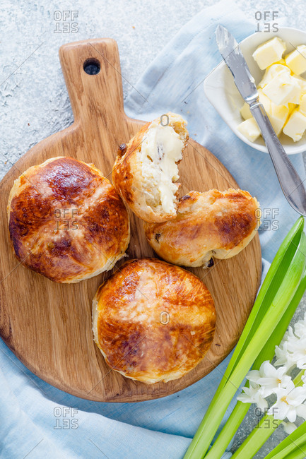 Hot cross buns with raisins and butter. Easter treat