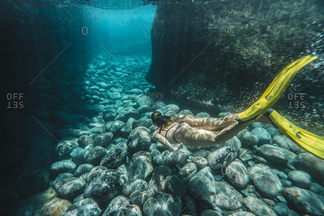 High Angle View Of Woman Diving Undersea Stock Photo Offset