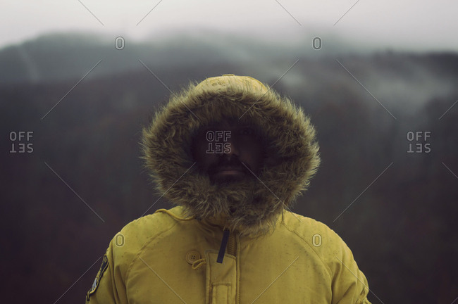 man in a fur coat stock photos - OFFSET