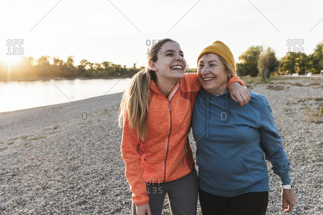 old person young person having fun together stock photos - OFFSET