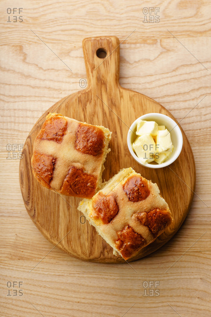 Holiday easter hot cross buns with butter