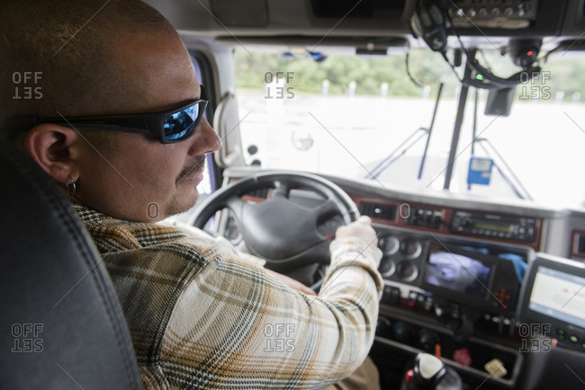 Man driving semi-truck