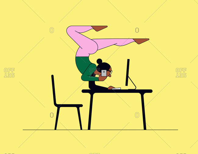 Woman doing yoga handstand while working on computer