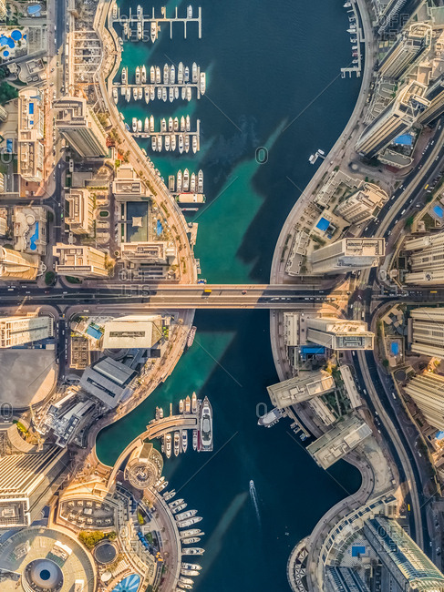 October 8, 2018: Aerial view of Dubai Marina with moored boats and skyscrapers, UAE.