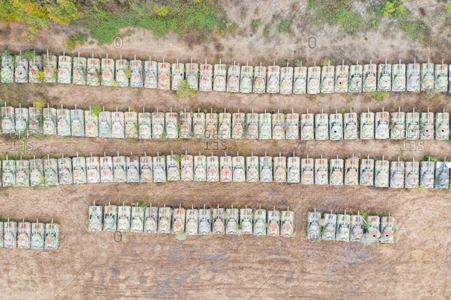 Aerial view above of old war tanks line up, Italy.